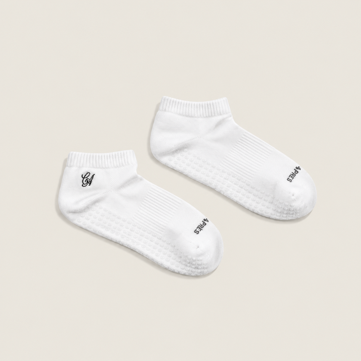 The Basic White Ankle Grip Sock — a white ankle-height grip sock with a silicone grip sole, by Café Après