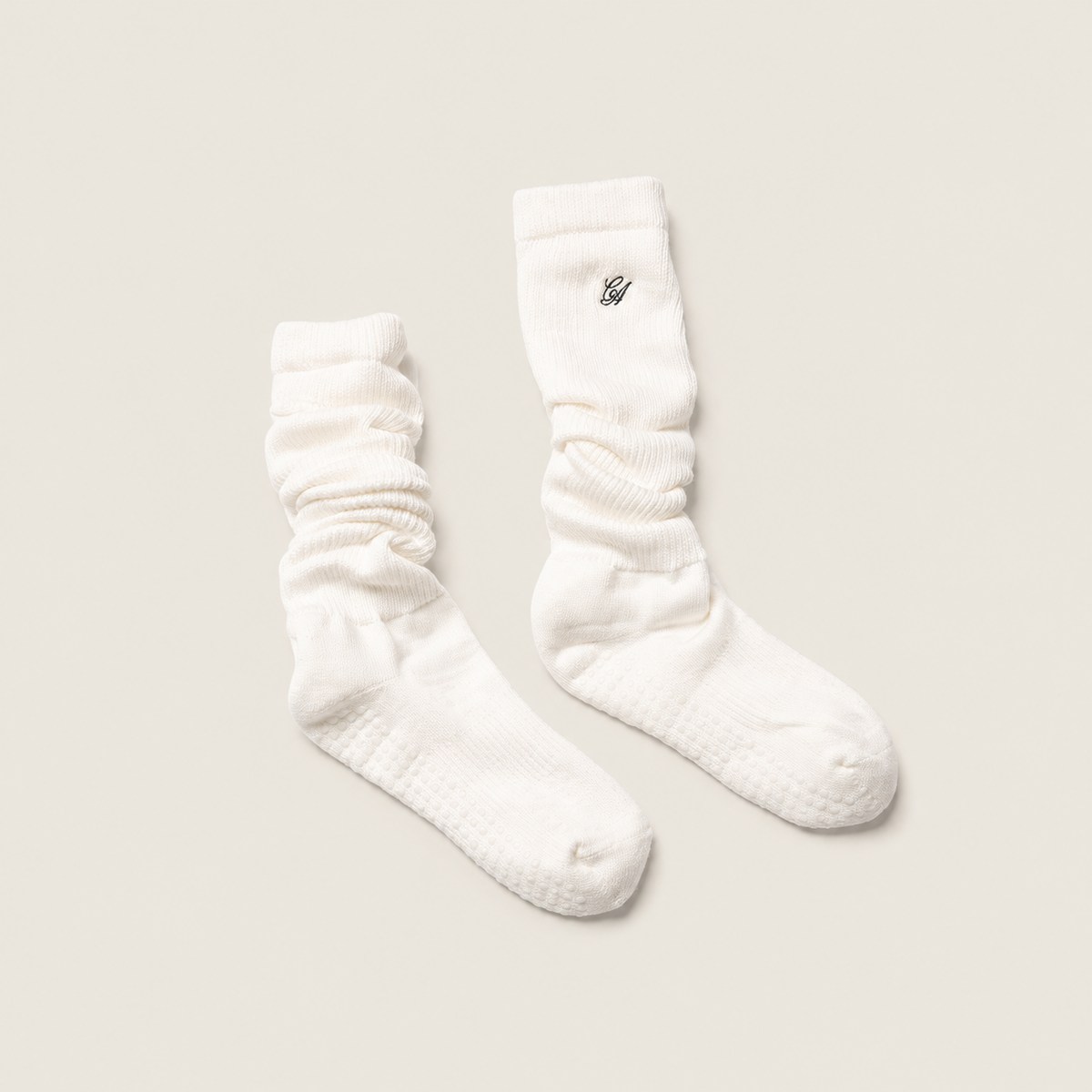 The Comfiest Cloud Sock with Grip — a plush scrunch-silhouette studio sock with a cushioned sole and grip bottom