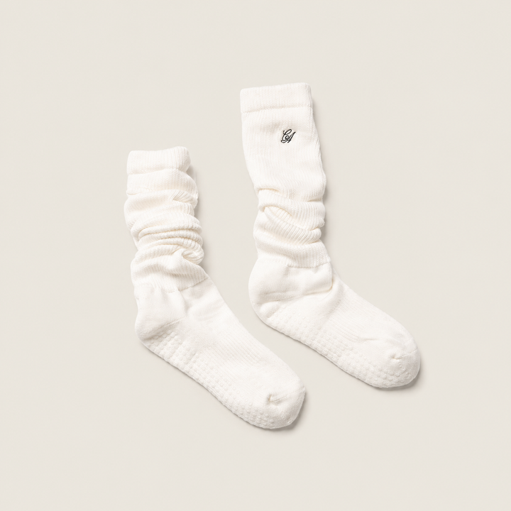 The Comfiest Cloud Sock with Grip — a plush scrunch-silhouette studio sock with a cushioned sole and grip bottom