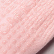 Close-up of pink textured grip socks