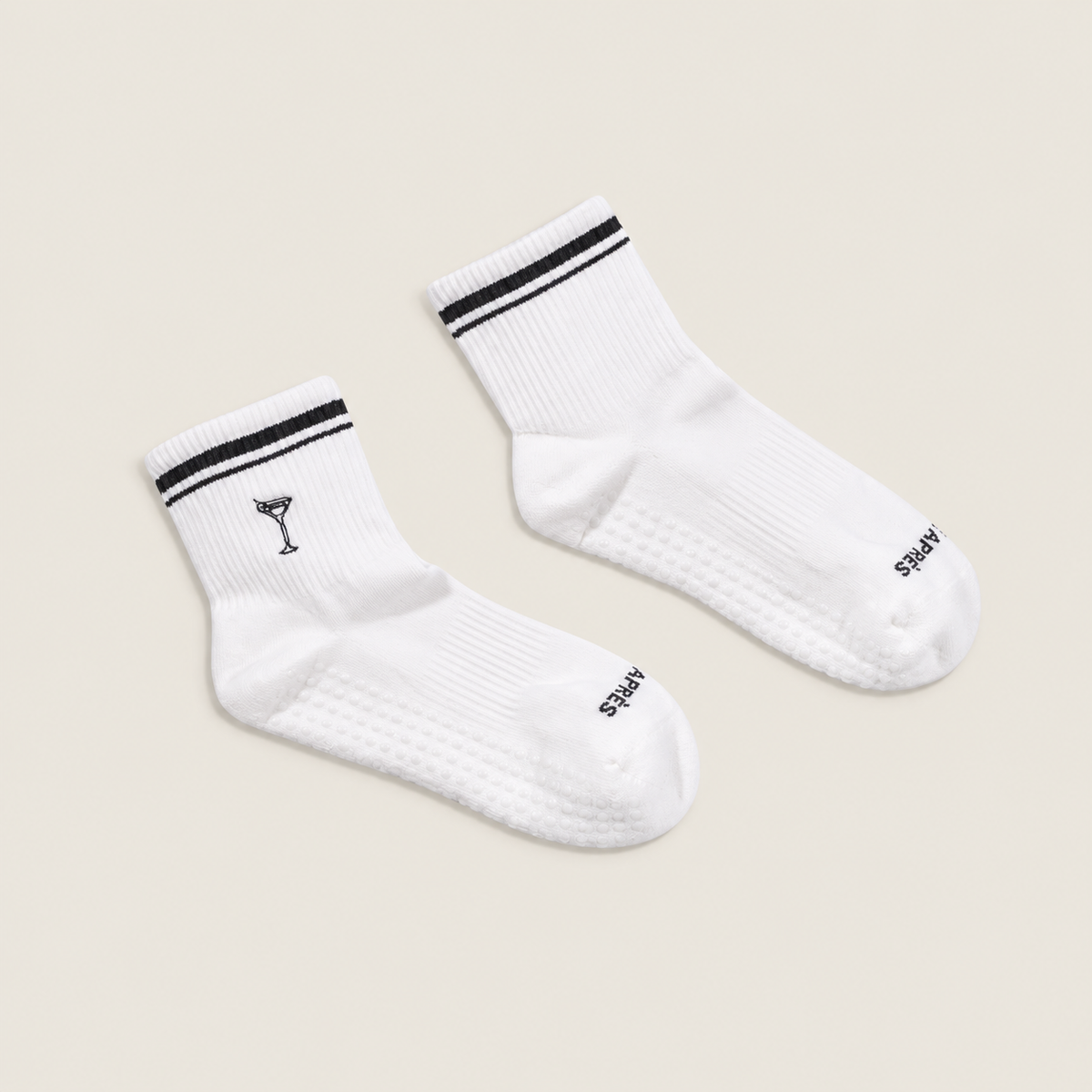 The Ellsworth Martini Quarter Grip Sock — a navy and white quarter grip sock with contrast striping and an embroidered martini motif