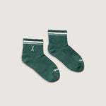 Load image into Gallery viewer, Pair of green socks with white stripes on a light gray background
