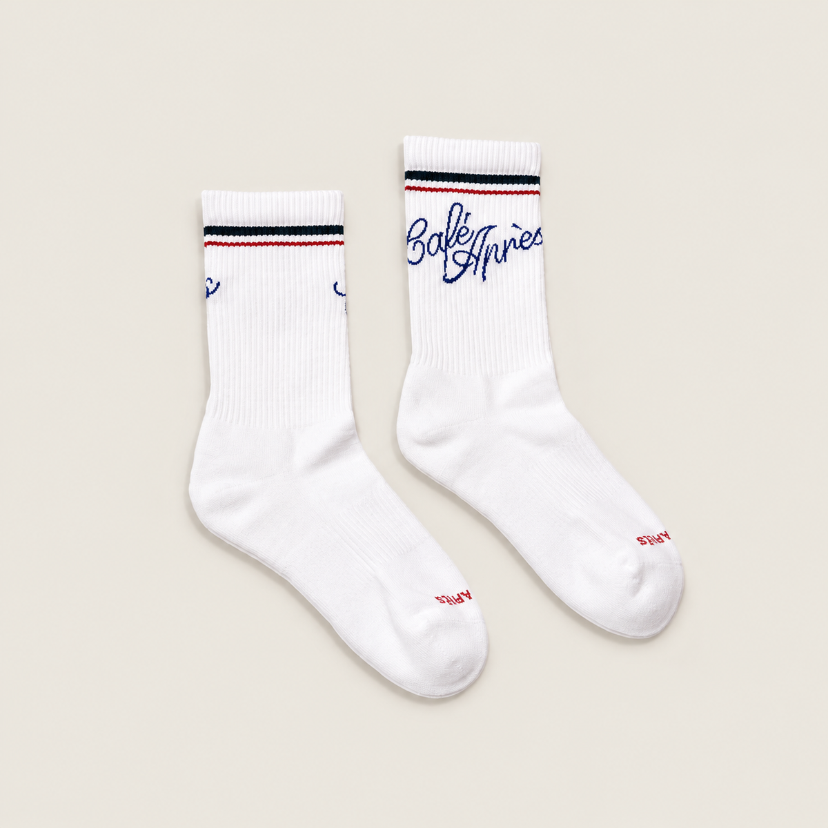 The Spottswood Crew Everyday Sock — a striped crew sock in Café Après script